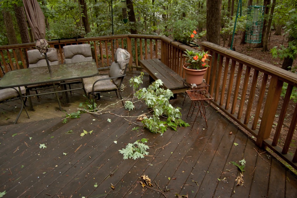 Broken branch on a deck, yard waste removal