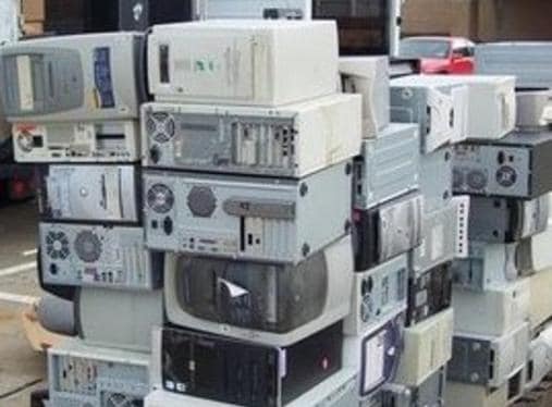 Stack of computers, electronic waste disposal